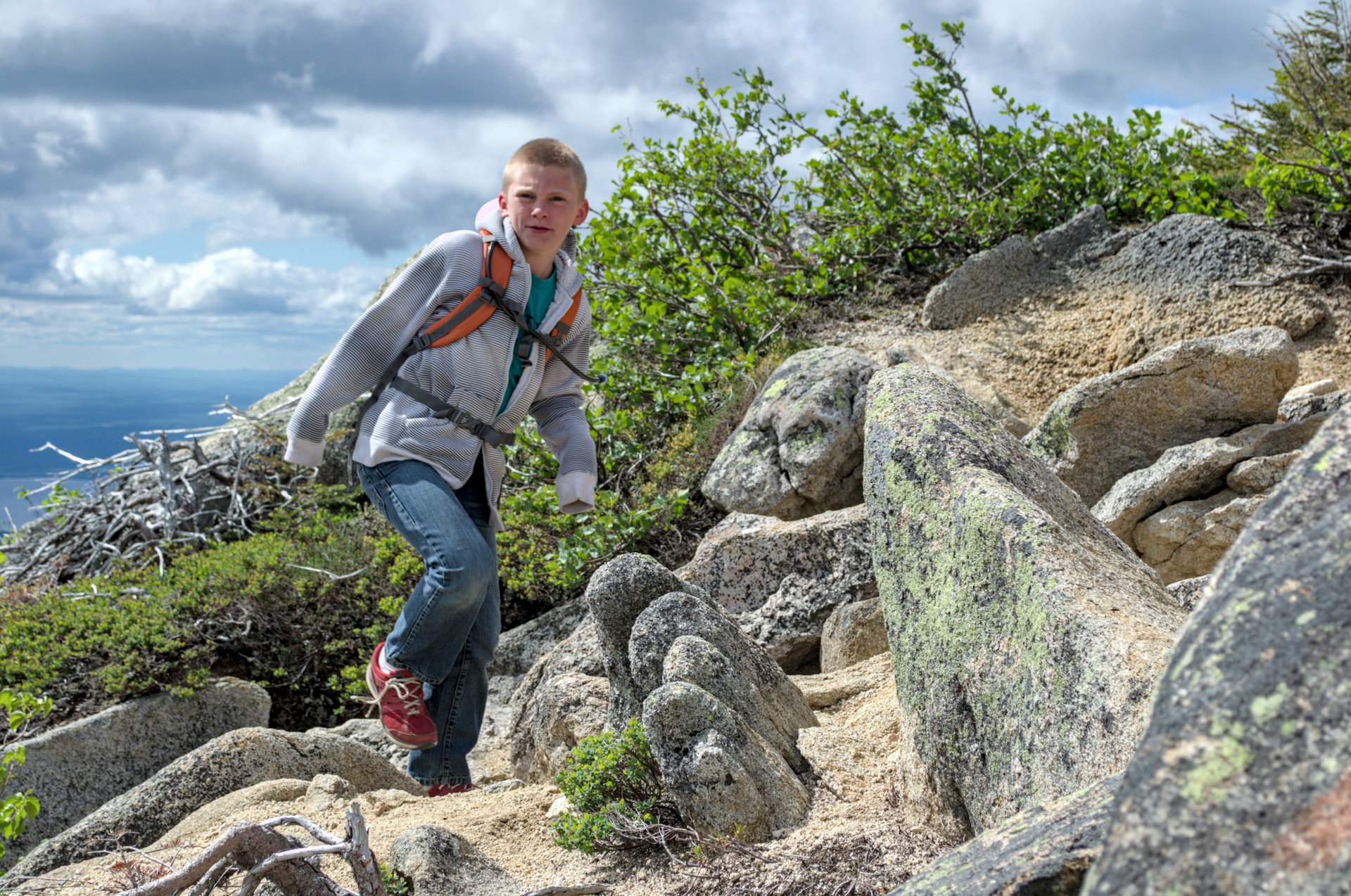 Scrambling the upper Hunt Trail above treeline — the kid found his rhythm on the granite about a mile below the summit